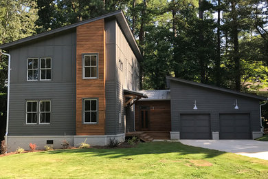 Trendy gray two-story house exterior photo in Atlanta
