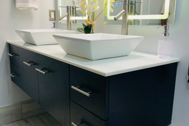 Example of a trendy double-sink shower bench design in Other with flat-panel cabinets, dark wood cabinets, a bidet, a vessel sink, quartzite countertops, white countertops and a floating vanity