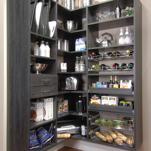 Small farmhouse kitchen pantry pictures - Kitchen pantry - small cottage l-shaped dark wood floor and brown floor kitchen pantry idea in Tampa with open cabinets, no island and black cabinets