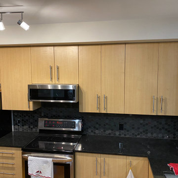 Luminous Harmony | Countertops and full-height backsplash renovation