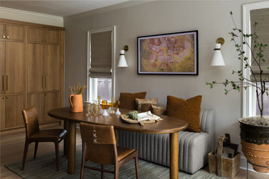 Example of a mid-sized trendy light wood floor, beige floor and wallpaper ceiling eat-in kitchen design in Baltimore
