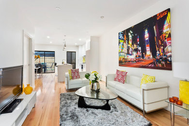 Photo of a modern family room in Melbourne.