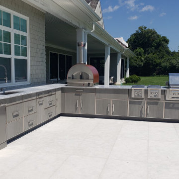 Resort like home boasts a resort like outdoor kitchen in BridgeHampton, NY