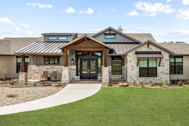 Mid-sized transitional multicolored one-story mixed siding and board and batten exterior home idea with a mixed material roof and a gray roof