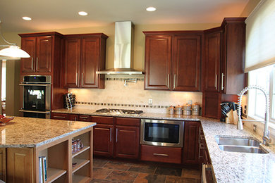Example of a transitional kitchen design in Charlotte