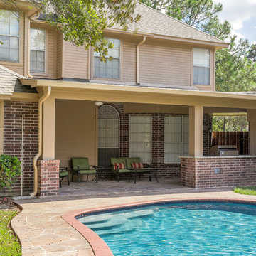 Stone Patio with Outdoor Kitchen and Pool