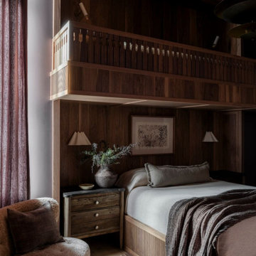 Antique Elm Paneling in Modern Lakehouse Bunk Loft Bedroom