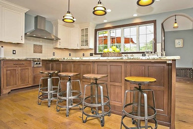 Example of a mountain style kitchen design in Burlington