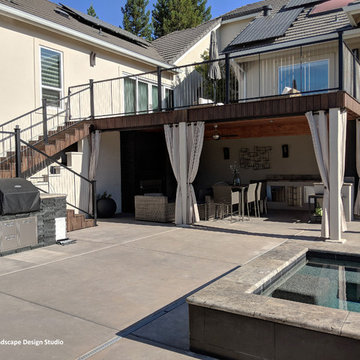 Transformaton: Outdoor fireplace, grill, bar, and spa
