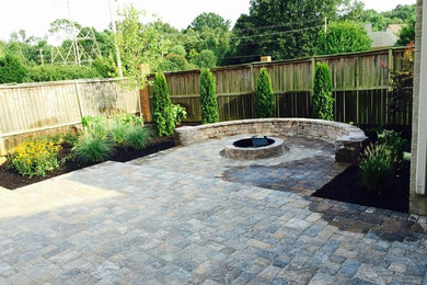 Mountain style brick patio photo in Other
