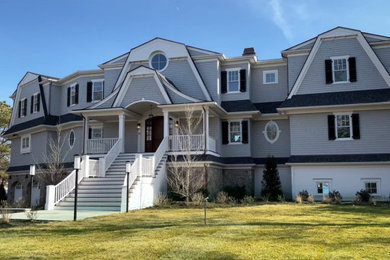 Large three-story house exterior photo in Boston