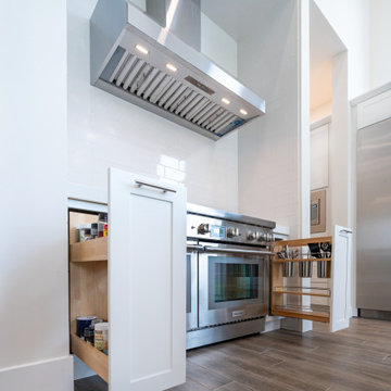 Modern White Shaker Kitchen with Oversized Island & Custom Storage Solutions