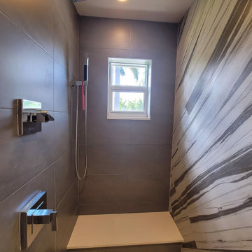 Diagonal striped tiles in bathroom shower