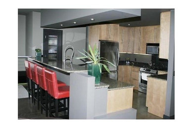 Example of a trendy kitchen design in Calgary