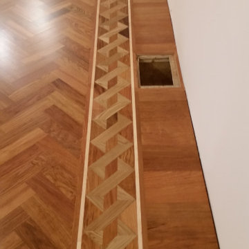 A Custom Herringbone Flooring Pattern With a Custom Border
