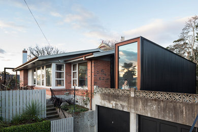 Contemporary exterior home idea in Other