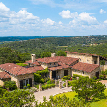 Aerial View of Residence Fully Integrated with Hill Country Terrain