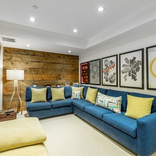 Photo of a small modern enclosed home cinema in Salt Lake City with carpet and a wall mounted tv.