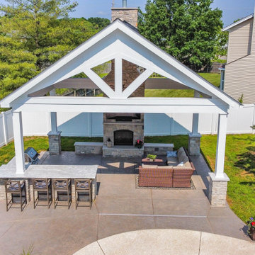 Open Gable Pool House with Fireplace and Grilling Area