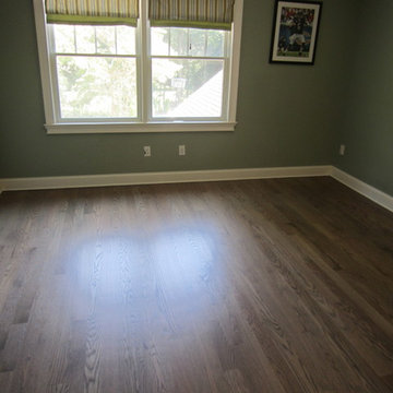 NISSEQUOGUE:  2 1/4" RED OAK W/ CUSTOM GREY BLEND STAIN + BONA TRAFFIC HD SATIN