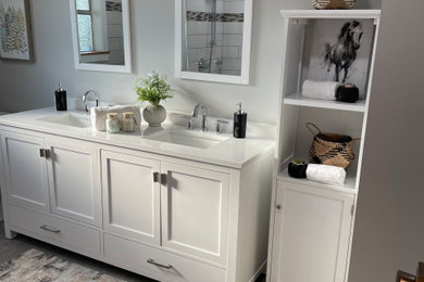 Example of a large transitional master porcelain tile, gray floor and double-sink bathroom design in Tampa with shaker cabinets, white cabinets, a one-piece toilet, gray walls, an undermount sink, quartz countertops, white countertops and a freestanding vanity