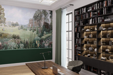 Diseño de estudio de estilo americano de tamaño medio con paredes verdes, suelo de madera clara, escritorio independiente y papel pintado