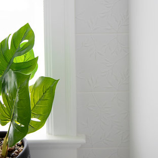 Inspiration for a medium sized beach style single-wall separated utility room in Vancouver with a single-bowl sink, recessed-panel cabinets, white cabinets, engineered stone countertops, white walls, porcelain flooring, a side by side washer and dryer, beige floors and yellow worktops.