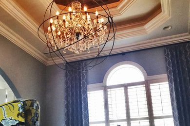 Dining room - eclectic dining room idea in Kansas City with gray walls