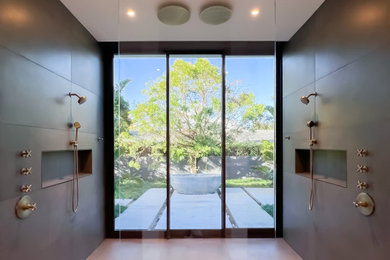 This is an example of a large modern shower room bathroom in Orlando with glass-front cabinets and a floating vanity unit.