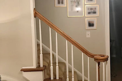 Foyer - mid-sized traditional medium tone wood floor and brown floor foyer idea in Atlanta with beige walls
