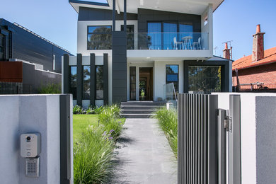 Photo of a large contemporary three-storey exterior in Melbourne.