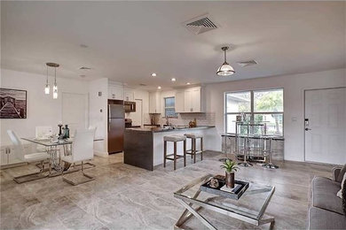 Example of a trendy home design design in Miami