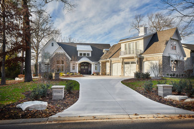 Home design - large traditional home design idea in Grand Rapids