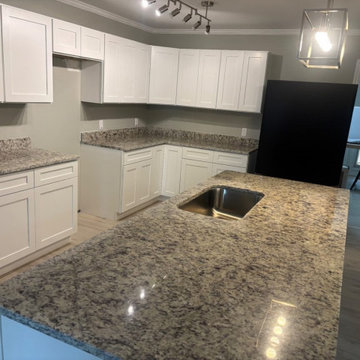 Granite kitchen countertops with island overhang