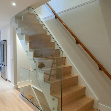 Open-Concept Ground Floor Reno with Customized IKEA Kitchen and Custom Staircase