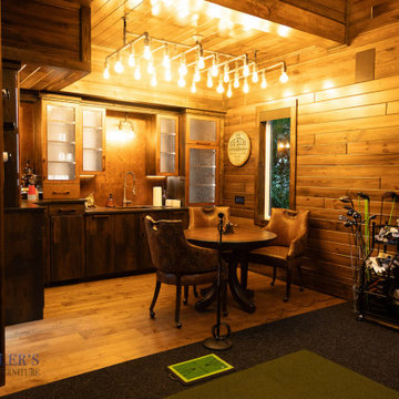 Rustic Home Entertainment Space with Home Bar and Golf Simulator