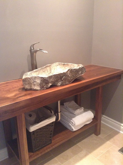 Stone sink in powder room needs backsplash