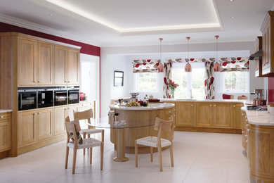 Inspiration for a large contemporary u-shaped kitchen in Other with a submerged sink, shaker cabinets, light wood cabinets and an island.