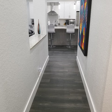 Two Toned Kitchen Full Remodel featuring White & Gray Cabinetry and Granite tops