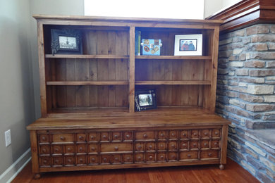 Example of a transitional open concept living room design in Minneapolis with a standard fireplace
