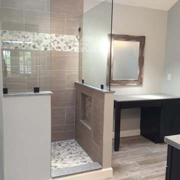 Master bath gardern tub and standing shower converted to large walk in shower