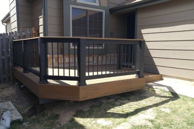 Photo of a mid-sized transitional deck in Denver with no cover.