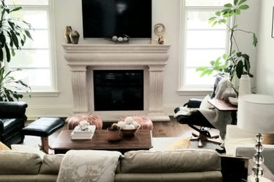 Inspiration for a contemporary living room remodel in Toronto with white walls