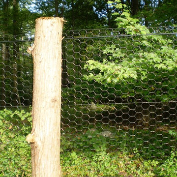 Steel Hex Web Deer Fence with Bark-On Cedar Posts
