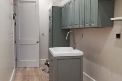 Laundry room remodels and cabinet painting. interior