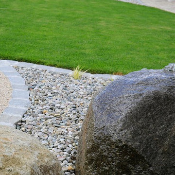 Gartenumgestaltung mit Naturstein und viel Raum