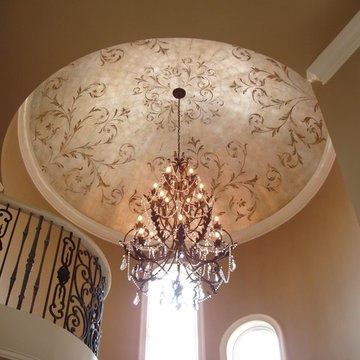 Silver leafed dome with scrollwork