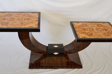 Cocktail table of exotic veneers and real ivory with swiveling asymmetric tops