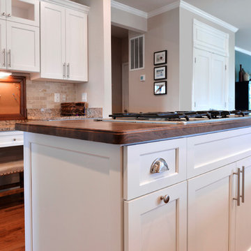 White Kitchen with Walnut Wood Counter Tops in Ashburn, VA