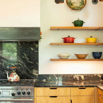 Artistic Cabin Kitchen with Vintage Charm